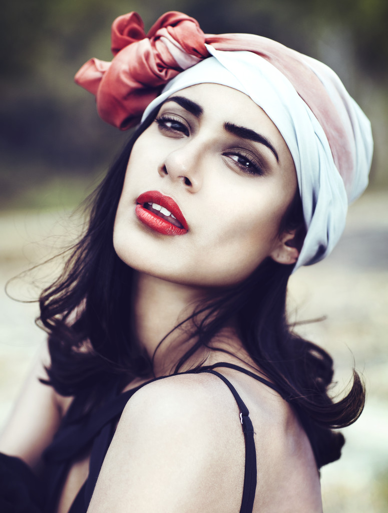 Beautiful fair skinned girl with silk bandanna and red lipstick.