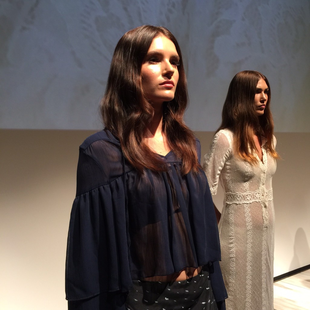 Two models standing in the Stevie May runway installation