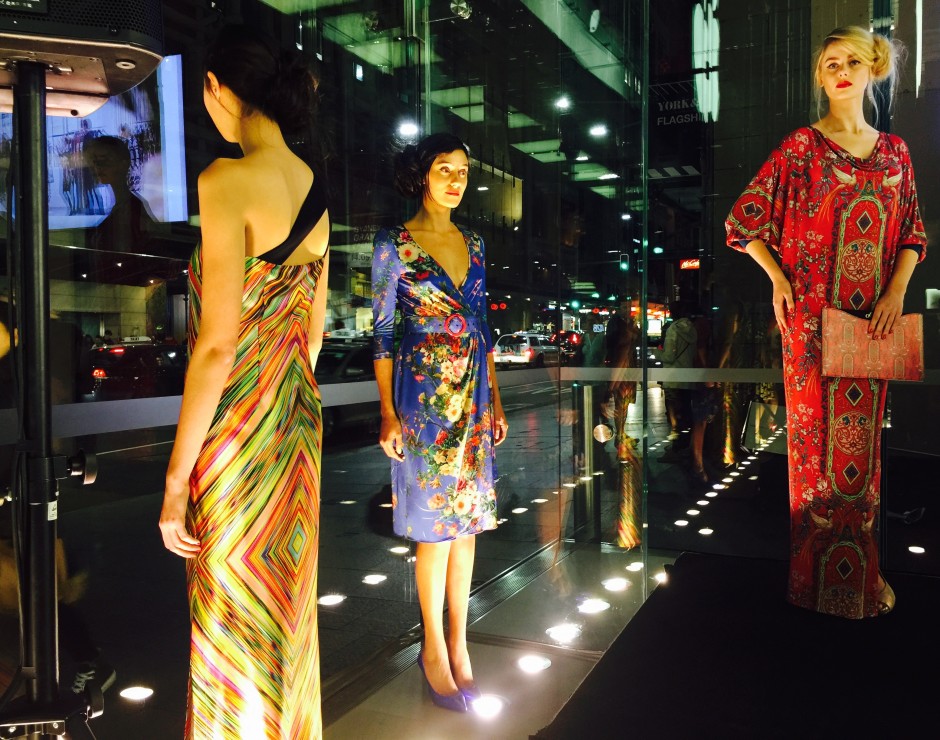 Picture of models standing in the window of the Apple store in Sydney at the launch of Leona Edmiston accessories May 2015