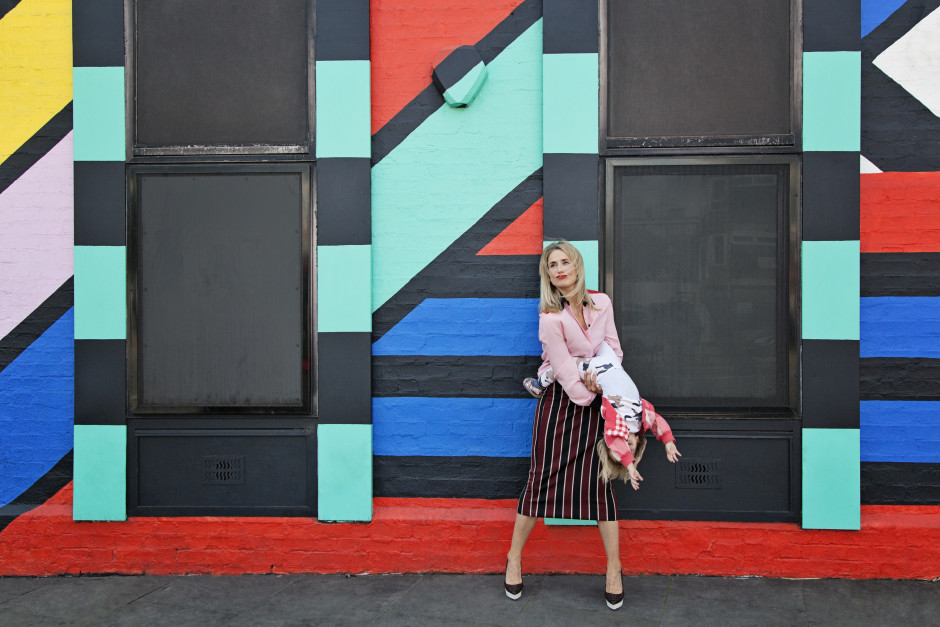 Anna from Mother Pukka, with her daughter Mae, in Shoreditch. Photographed outside the Splice TV building painted by Camille Walala.