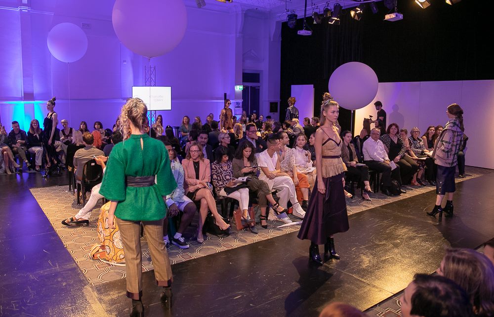 Models standing backstage at the Fashion Design Studio Graduate Runway 2018 at Ultimo TAFE 